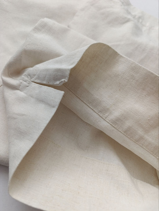 شلوار زنانه لینن برند DOCKERS استوک اورجینال رنگ شیری نمای نزدیک جنس پارچه