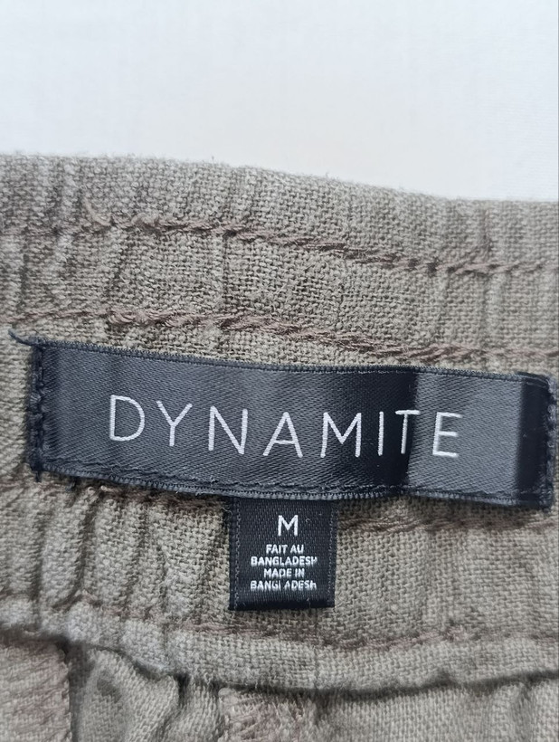 شلوارک زنانه لینن برند DYNAMITE استوک اورجینال سبز زیتونی نمای اتیکت و برند