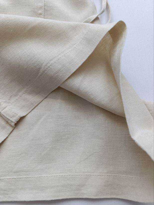 شلوارک زنانه لینن برند J.CREW استوک اورجینال رنگ کرم نمای نزدیک جنس پارچه