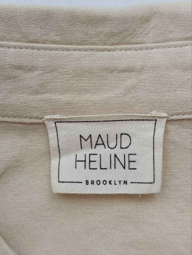 تاپ زنانه نخی برند MAUD HELINE استوک اورجینال رنگ کرم نمای برند و اتیکت