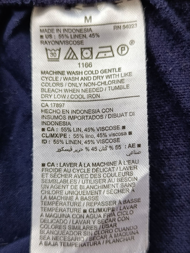 شلوارک زنانه لینن برند OLD NAVY استوک اورجینال رنگ سرمه ای نمای اتیکت مشخصات