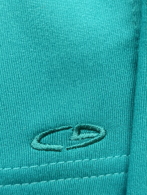 لباس ورزشی برند BY CHAMPION استوک اورجینال رنگ فیروزه ای نمای لوگو