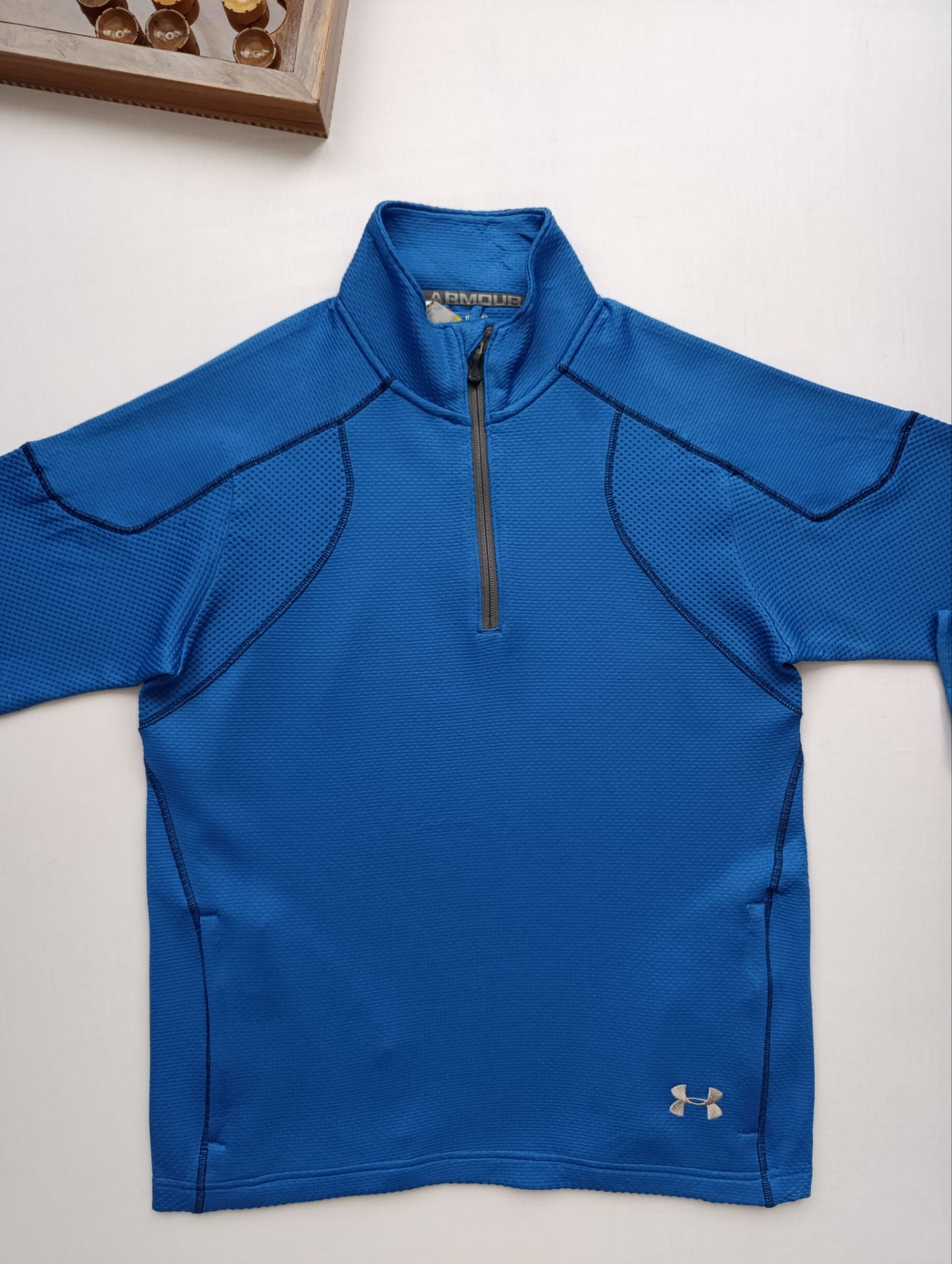 لباس ورزشی برند UNDER ARMOUR استوک اورجینال رنگ آبی نمای جلو