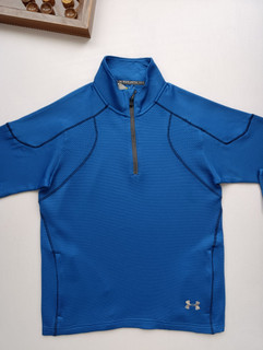 لباس ورزشی برند UNDER ARMOUR استوک اورجینال رنگ آبی نمای جلو