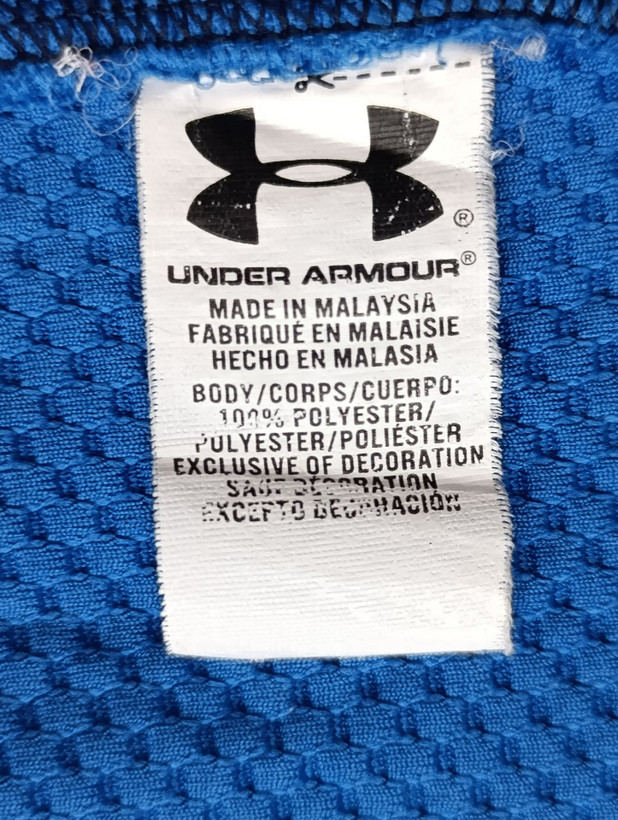 لباس ورزشی برند UNDER ARMOUR استوک اورجینال رنگ آبی نمای اتیکت مشخصات