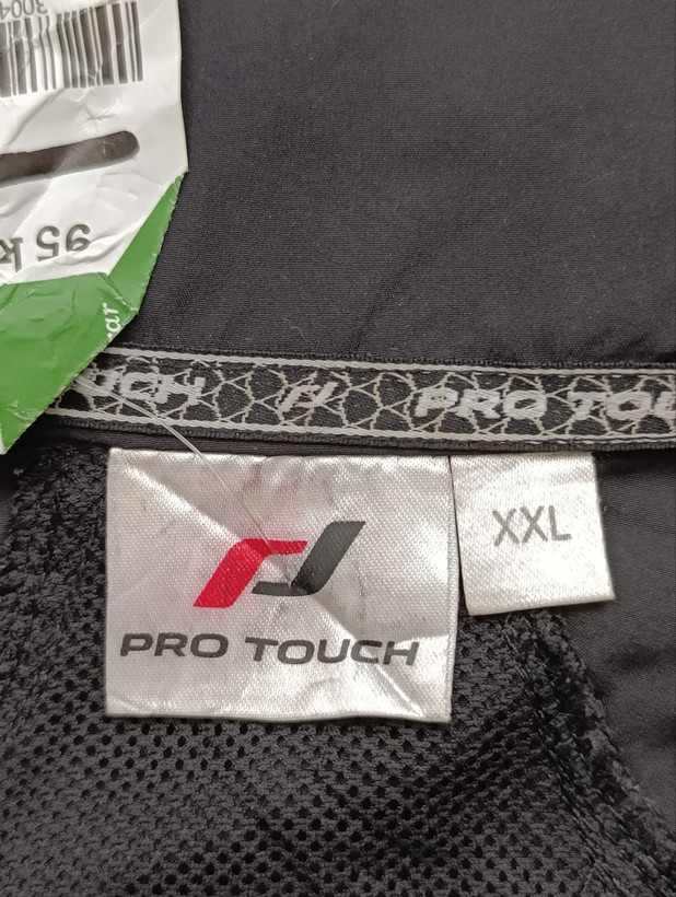 بادگیر مردانه برند PRO TOUCH استوک اورجینال رنگ مشکی نمای اتیکت و برند