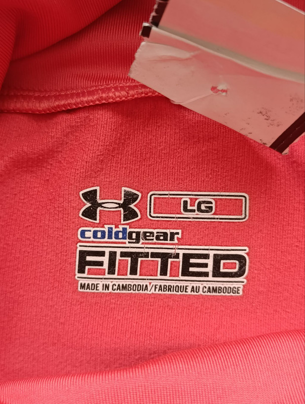لباس ورزشی زنانه برند UNDER ARMOUR استوک اورجینال رنگ صورتی نمای برند محصول