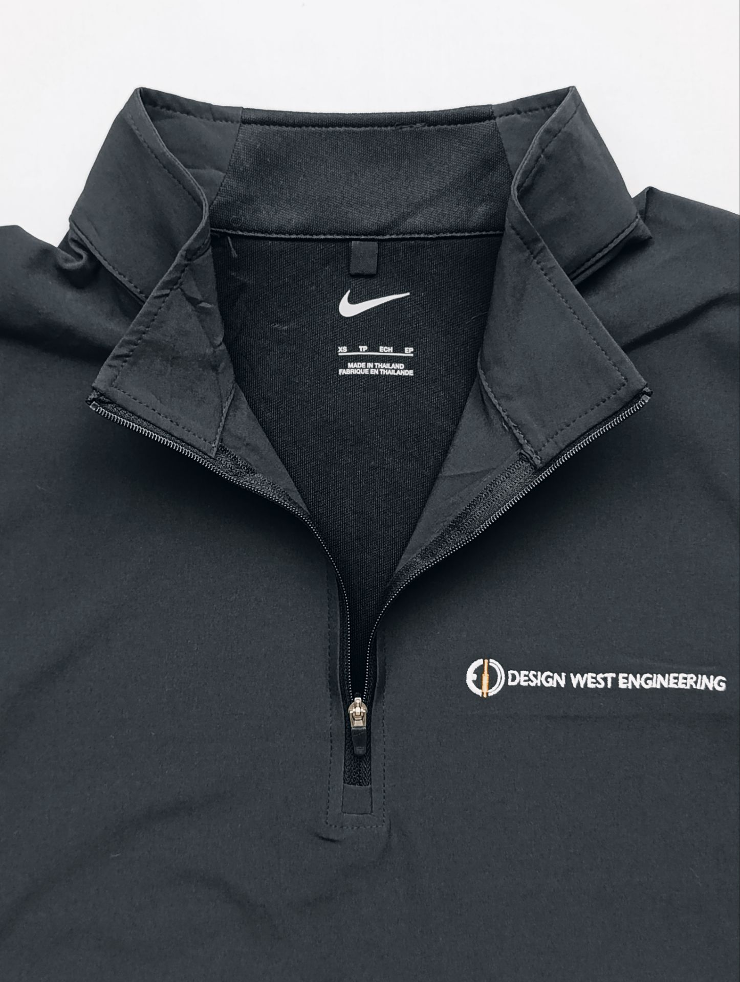 لباس ورزشی مردانه برند NIKE استوک اورجینال نیم زیپ نمای یقه