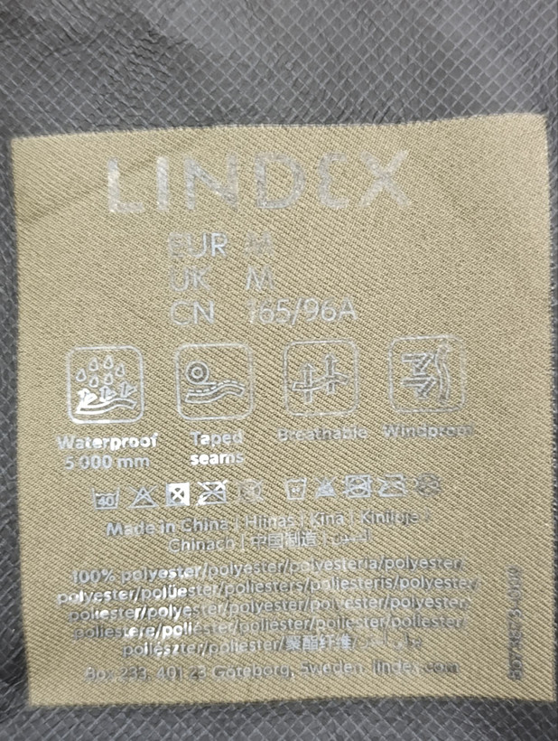 پالتو بارانی زنانه برند LINDEX استوک اورجینال ضدآب نمای اتیکت برند و مشخصات