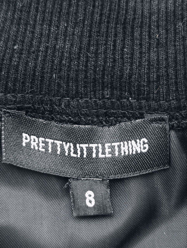 بادگیر مشتی زنانه برند PRETTY LITTLE THING استوک اورجینال مشکی نمای اتیکت برند
