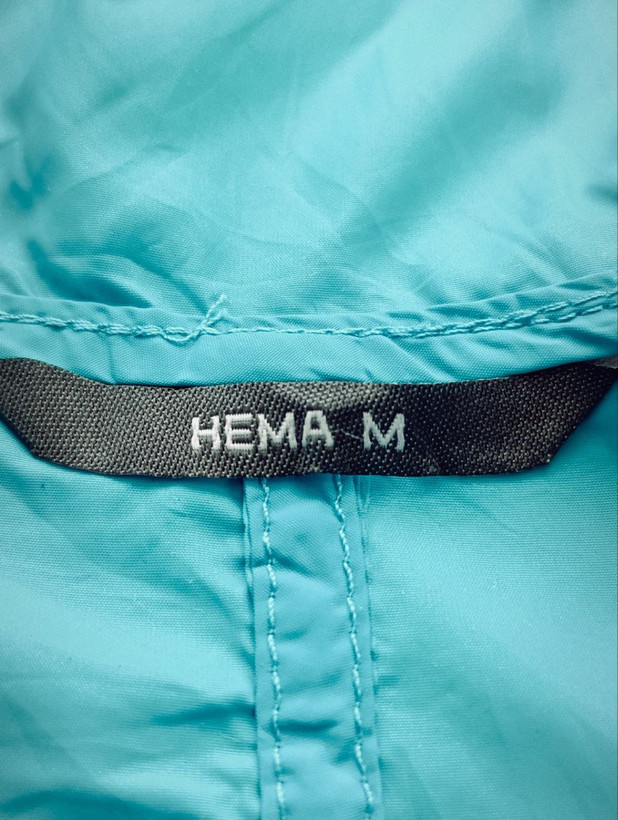 بادگیر مشتی برند HEMA استوک اورجینال رنگ فیروزه ای نمای اتیکت برند