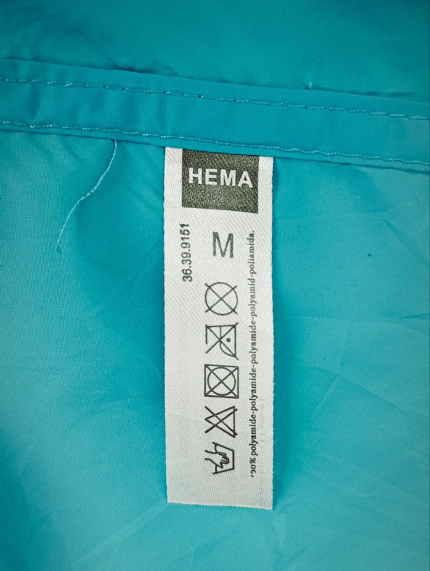 بادگیر مشتی برند HEMA استوک اورجینال رنگ فیروزه ای نمای اتیکت مشخصات