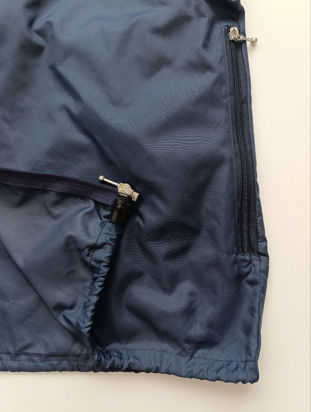 بادگیر مشتی برند COTOPAXI استوک اورجینال یک لایه نمای نزدیک جنس پارچه